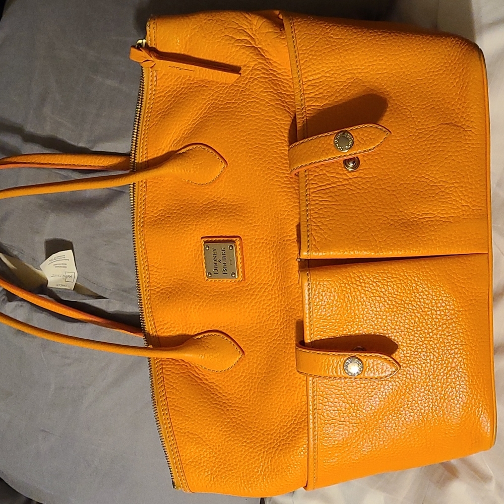 Large orange Dooney and Bourke leather purse